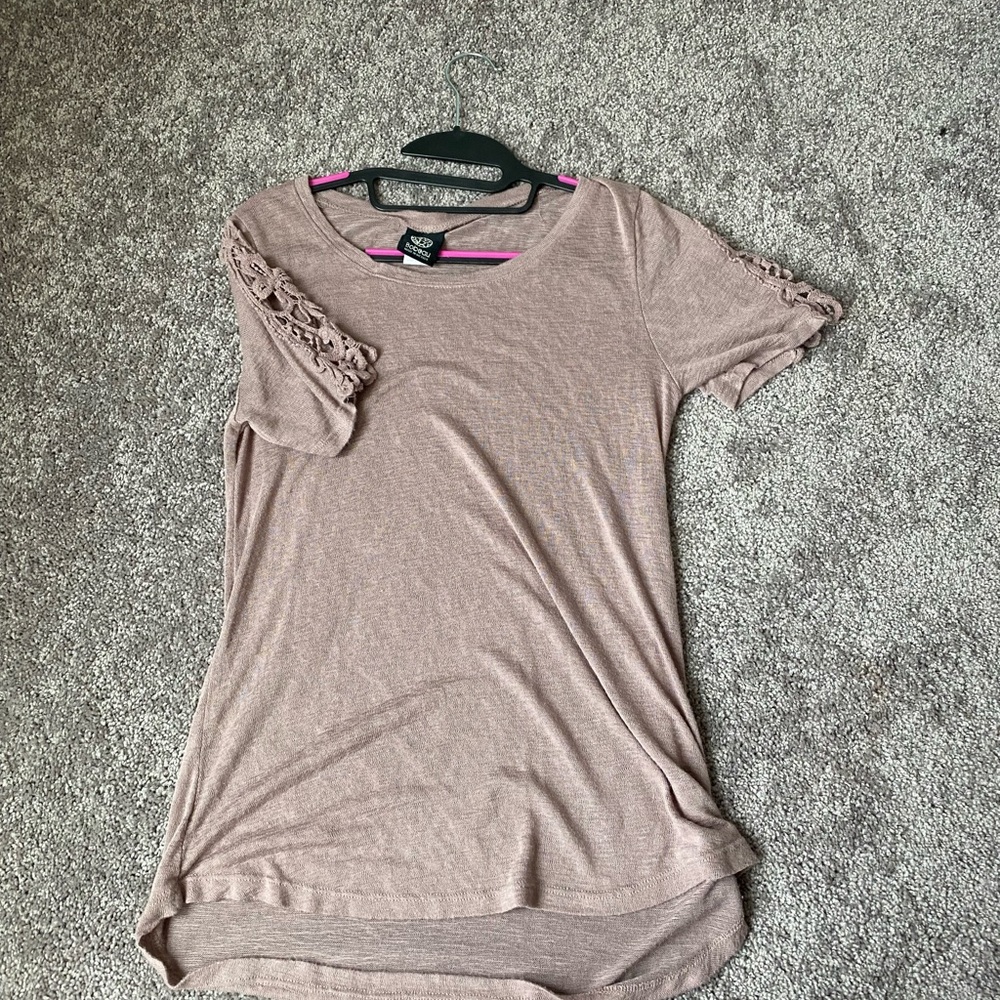 Blouse with embellished sleeve